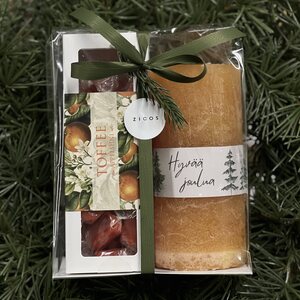 Lahjapakkaus appelsiini toffeet ja kynttilä